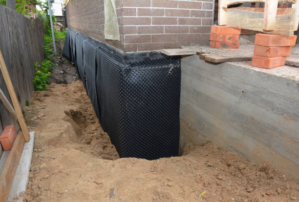 Happy homeowners after waterproofing job in Marcus Hook